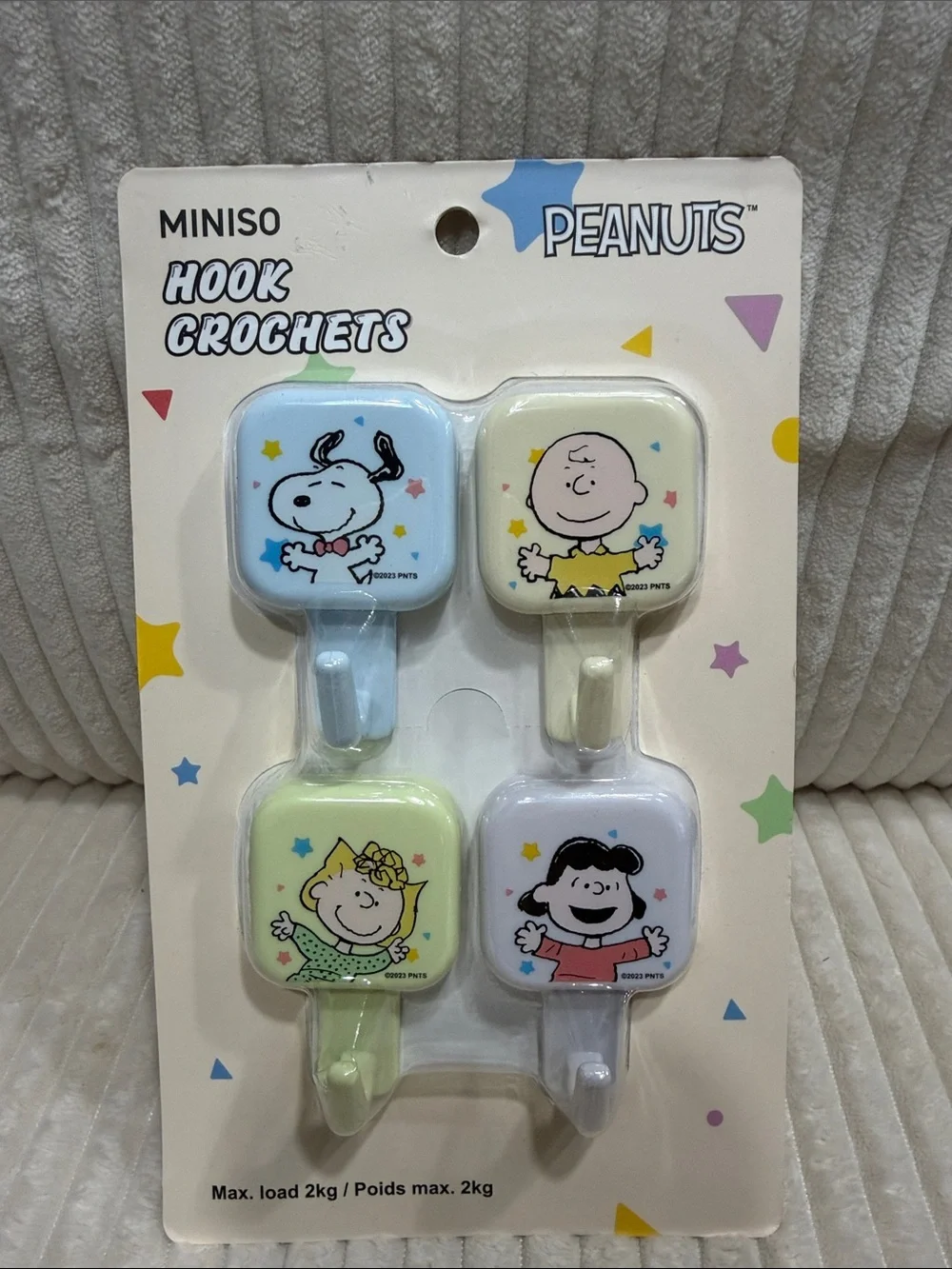Peanuts Kids Adhesive Hooks - Set of 4 (Blue, Cream, Light Green, White). New